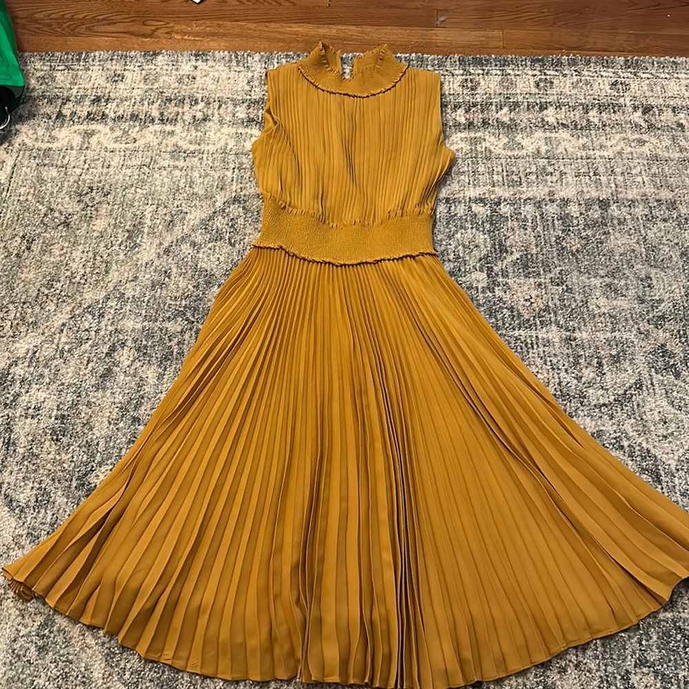 Yellow pleated dress